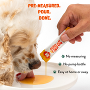Pre-measured FAM Pets fish oil stick poured onto dog food with no measuring or pump bottle
