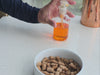 The difference between a traditional fish oil pump bottle and FAM Pets airless spray